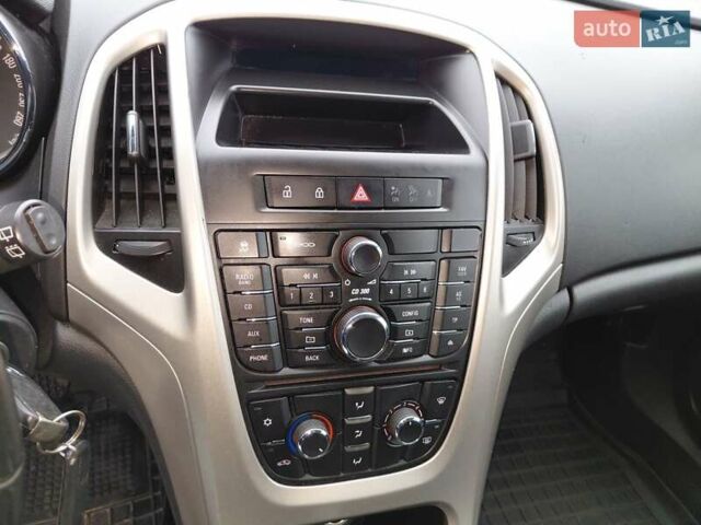 Черный Опель Астра, объемом двигателя 1.25 л и пробегом 1 тыс. км за 6200 $, фото 7 на Automoto.ua