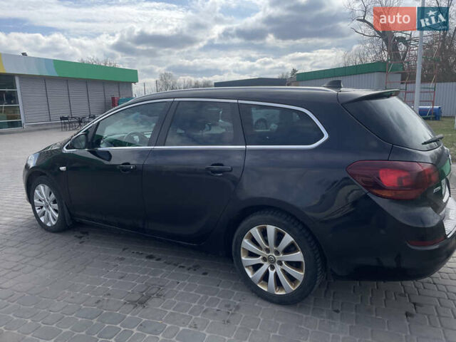 Черный Опель Астра, объемом двигателя 1.69 л и пробегом 245 тыс. км за 7200 $, фото 6 на Automoto.ua