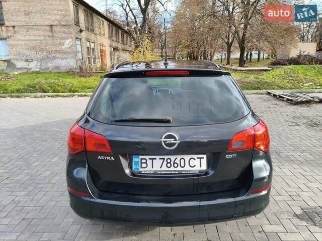 Черный Опель Астра, объемом двигателя 1.7 л и пробегом 238 тыс. км за 6000 $, фото 3 на Automoto.ua