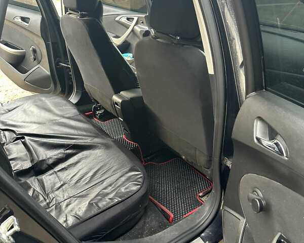 Черный Опель Астра, объемом двигателя 1.3 л и пробегом 264 тыс. км за 6500 $, фото 9 на Automoto.ua