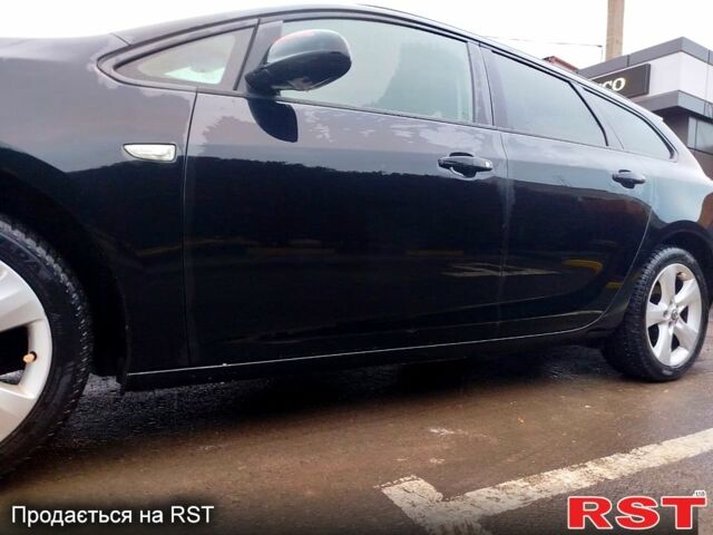 Черный Опель Астра, объемом двигателя 1.4 л и пробегом 307 тыс. км за 6500 $, фото 4 на Automoto.ua