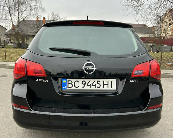 Черный Опель Астра, объемом двигателя 1.7 л и пробегом 256 тыс. км за 6200 $, фото 6 на Automoto.ua