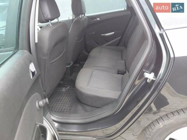 Черный Опель Астра, объемом двигателя 1.25 л и пробегом 1 тыс. км за 6200 $, фото 23 на Automoto.ua