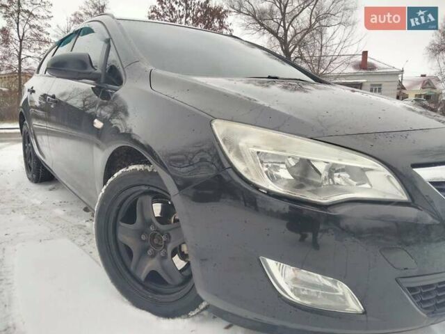 Черный Опель Астра, объемом двигателя 1.7 л и пробегом 290 тыс. км за 6200 $, фото 12 на Automoto.ua