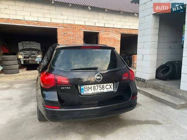 Черный Опель Астра, объемом двигателя 1.7 л и пробегом 231 тыс. км за 5800 $, фото 7 на Automoto.ua