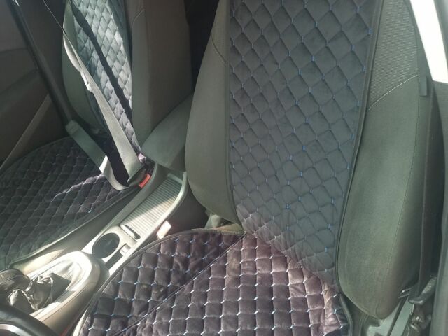 Черный Опель Астра, объемом двигателя 1.7 л и пробегом 278 тыс. км за 6950 $, фото 6 на Automoto.ua