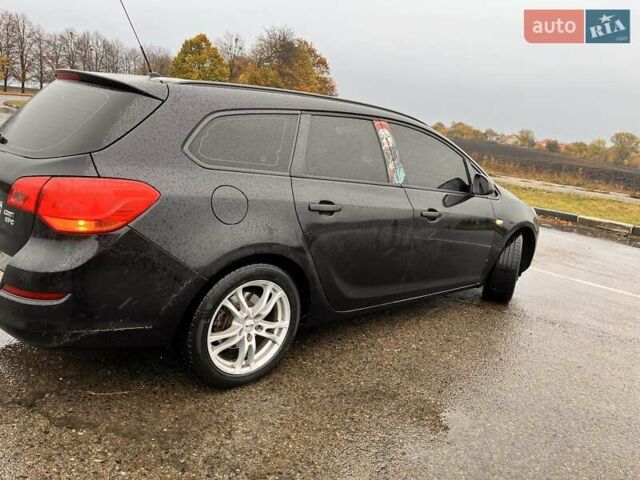 Черный Опель Астра, объемом двигателя 1.7 л и пробегом 252 тыс. км за 6850 $, фото 8 на Automoto.ua