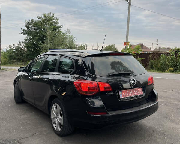 Черный Опель Астра, объемом двигателя 1.6 л и пробегом 182 тыс. км за 8100 $, фото 7 на Automoto.ua