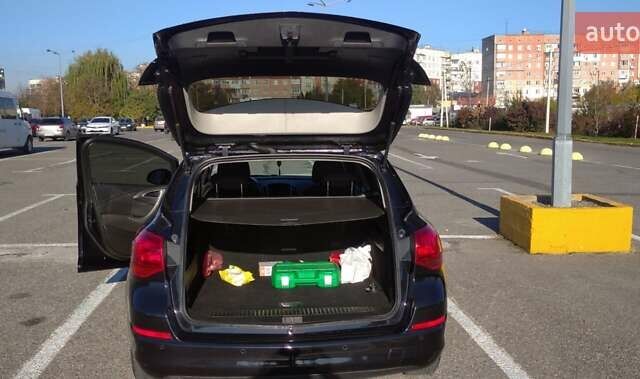 Черный Опель Астра, объемом двигателя 1.25 л и пробегом 300 тыс. км за 6500 $, фото 10 на Automoto.ua