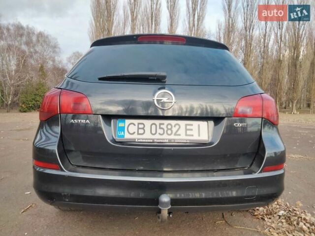 Черный Опель Астра, объемом двигателя 1.7 л и пробегом 270 тыс. км за 7000 $, фото 8 на Automoto.ua