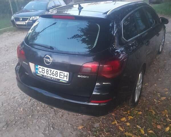 Чорний Опель Астра, об'ємом двигуна 1.2 л та пробігом 293 тис. км за 6950 $, фото 7 на Automoto.ua