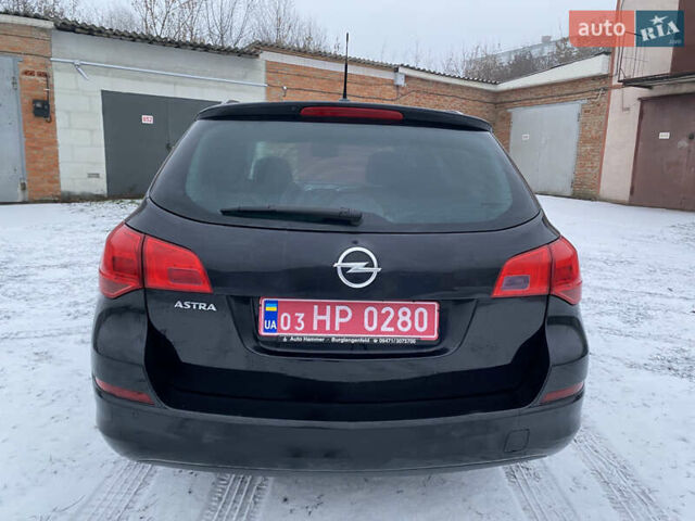Черный Опель Астра, объемом двигателя 1.6 л и пробегом 230 тыс. км за 7300 $, фото 7 на Automoto.ua