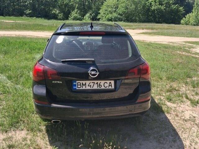 Черный Опель Астра, объемом двигателя 2 л и пробегом 218 тыс. км за 7200 $, фото 11 на Automoto.ua