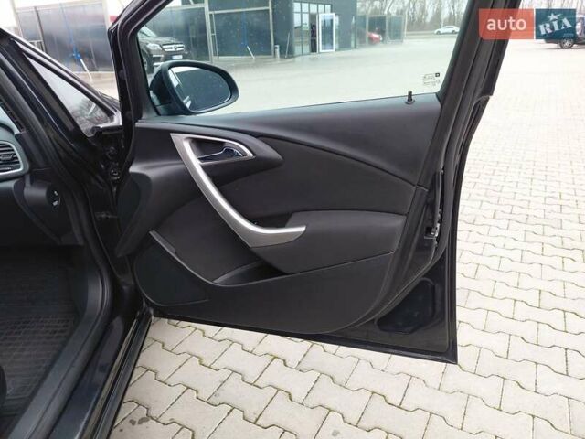 Черный Опель Астра, объемом двигателя 1.25 л и пробегом 1 тыс. км за 6200 $, фото 18 на Automoto.ua