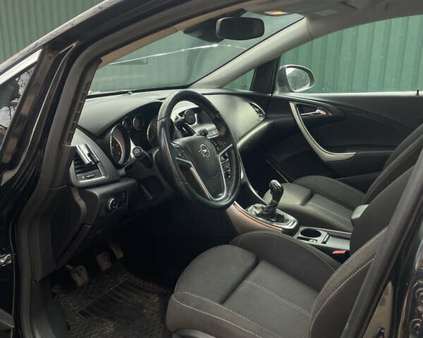 Черный Опель Астра, объемом двигателя 1.69 л и пробегом 245 тыс. км за 7200 $, фото 7 на Automoto.ua