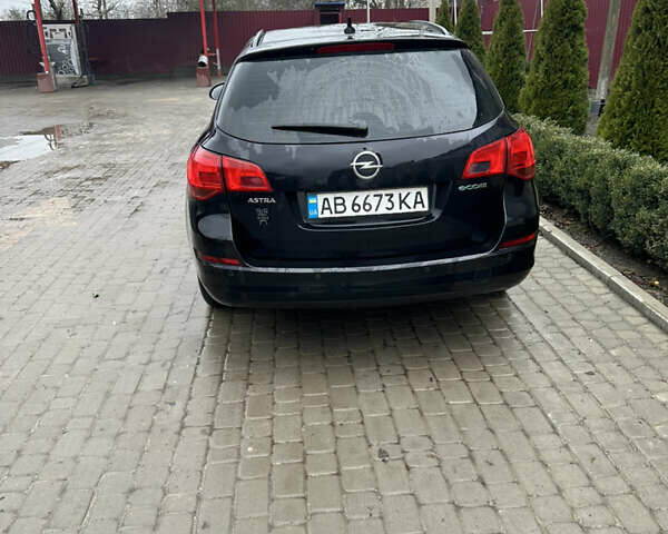 Черный Опель Астра, объемом двигателя 1.3 л и пробегом 264 тыс. км за 6500 $, фото 2 на Automoto.ua