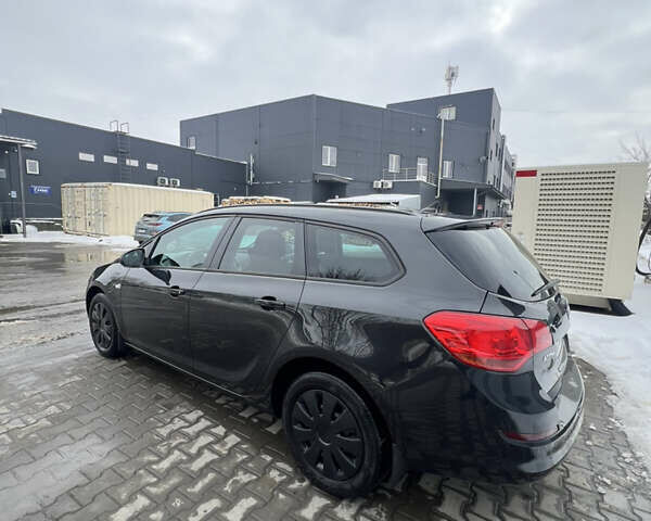 Черный Опель Астра, объемом двигателя 1.7 л и пробегом 218 тыс. км за 6650 $, фото 4 на Automoto.ua