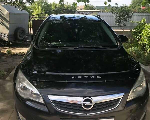 Опель Астра 2011 у Ямпіль на Automoto.ua Чорний Опель Астра, об'ємом двигуна 1.25 л та пробігом 255 тис. км за 5300 $, фото 1 на Automoto.ua