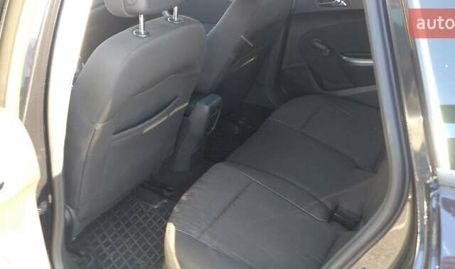 Черный Опель Астра, объемом двигателя 1.25 л и пробегом 300 тыс. км за 6500 $, фото 11 на Automoto.ua