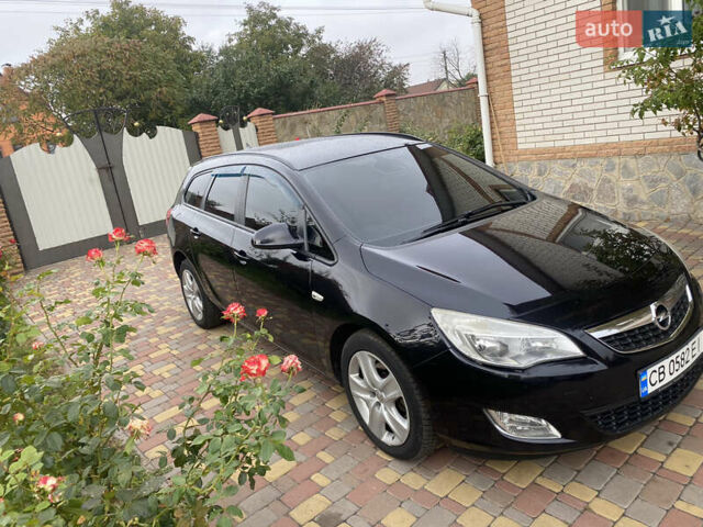 Черный Опель Астра, объемом двигателя 1.69 л и пробегом 280 тыс. км за 6700 $, фото 2 на Automoto.ua