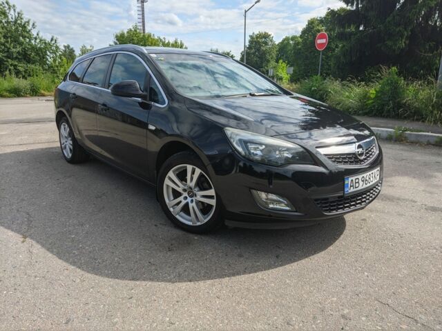 Черный Опель Астра, объемом двигателя 1.4 л и пробегом 209 тыс. км за 6700 $, фото 1 на Automoto.ua