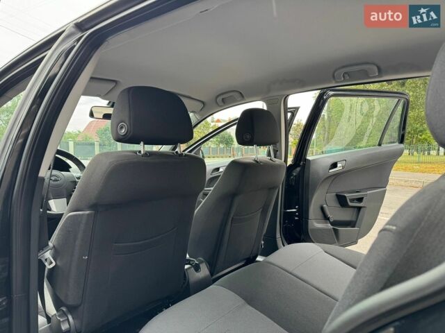 Черный Опель Астра, объемом двигателя 1.6 л и пробегом 170 тыс. км за 6399 $, фото 43 на Automoto.ua