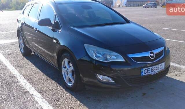 Черный Опель Астра, объемом двигателя 1.25 л и пробегом 300 тыс. км за 6500 $, фото 2 на Automoto.ua