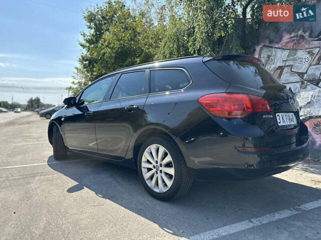 Черный Опель Астра, объемом двигателя 1.6 л и пробегом 238 тыс. км за 6500 $, фото 1 на Automoto.ua