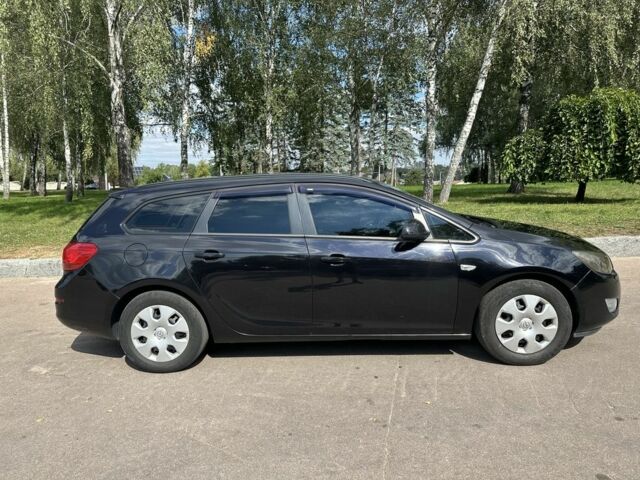 Черный Опель Астра, объемом двигателя 1.2 л и пробегом 345 тыс. км за 5950 $, фото 3 на Automoto.ua