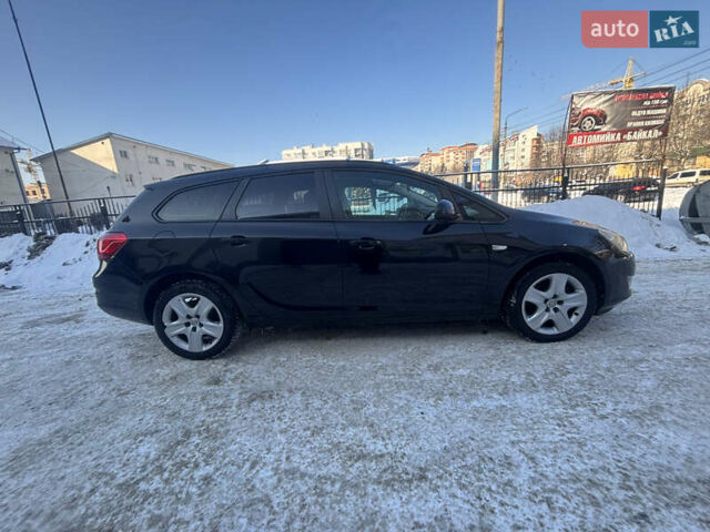 Чорний Опель Астра, об'ємом двигуна 1.7 л та пробігом 246 тис. км за 6799 $, фото 6 на Automoto.ua