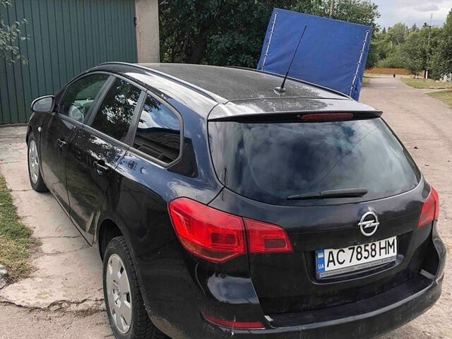 Черный Опель Астра, объемом двигателя 1.7 л и пробегом 266 тыс. км за 5100 $, фото 2 на Automoto.ua
