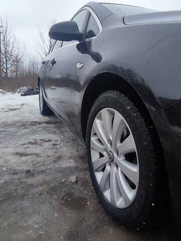 Черный Опель Астра, объемом двигателя 1.7 л и пробегом 232 тыс. км за 7700 $, фото 3 на Automoto.ua