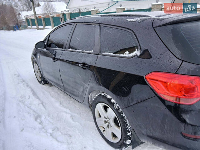 Черный Опель Астра, объемом двигателя 1.7 л и пробегом 265 тыс. км за 6500 $, фото 11 на Automoto.ua