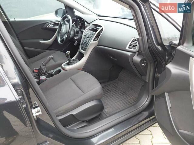 Черный Опель Астра, объемом двигателя 1.25 л и пробегом 1 тыс. км за 6200 $, фото 15 на Automoto.ua