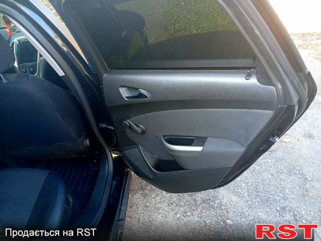 Черный Опель Астра, объемом двигателя 1.7 л и пробегом 315 тыс. км за 6300 $, фото 2 на Automoto.ua