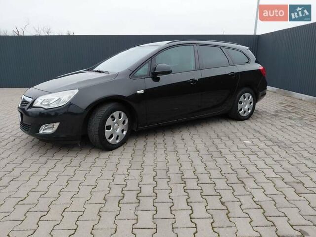 Черный Опель Астра, объемом двигателя 1.25 л и пробегом 1 тыс. км за 6200 $, фото 36 на Automoto.ua