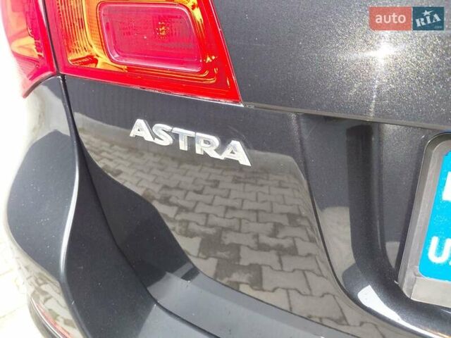Черный Опель Астра, объемом двигателя 1.25 л и пробегом 1 тыс. км за 6200 $, фото 16 на Automoto.ua