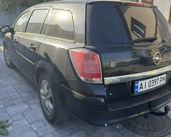 Черный Опель Астра, объемом двигателя 1.6 л и пробегом 230 тыс. км за 5400 $, фото 5 на Automoto.ua