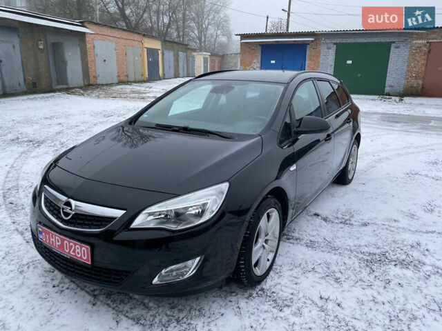 Черный Опель Астра, объемом двигателя 1.6 л и пробегом 230 тыс. км за 7300 $, фото 2 на Automoto.ua