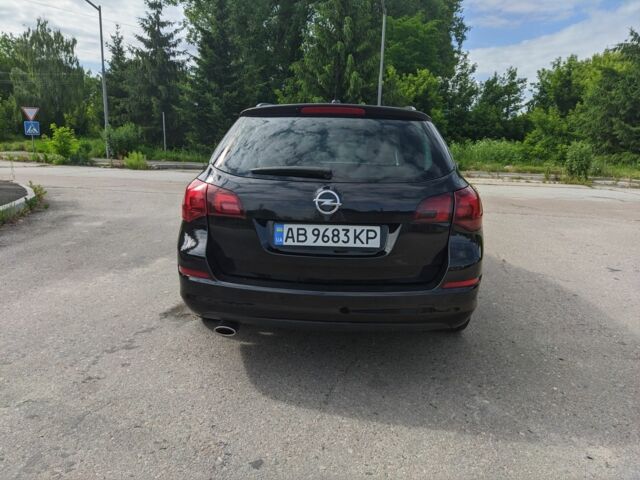 Черный Опель Астра, объемом двигателя 1.4 л и пробегом 209 тыс. км за 6700 $, фото 4 на Automoto.ua