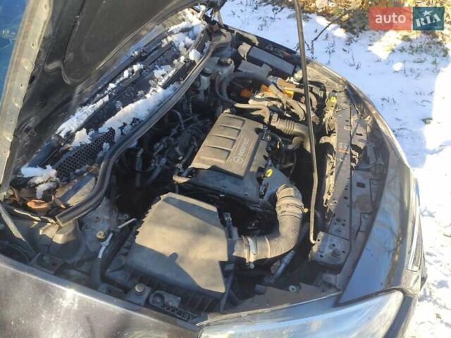 Черный Опель Астра, объемом двигателя 1.4 л и пробегом 229 тыс. км за 8760 $, фото 5 на Automoto.ua