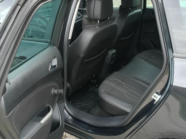 Черный Опель Астра, объемом двигателя 1.7 л и пробегом 2 тыс. км за 6200 $, фото 4 на Automoto.ua