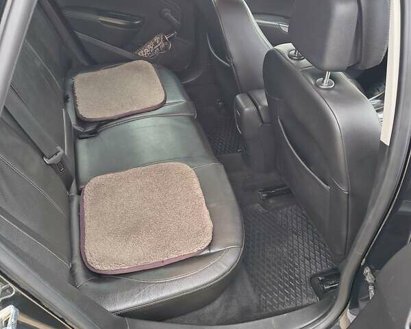 Черный Опель Астра, объемом двигателя 2 л и пробегом 175 тыс. км за 8300 $, фото 37 на Automoto.ua