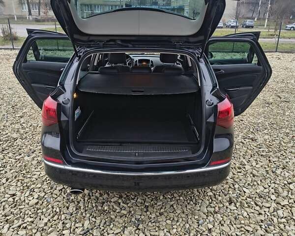 Черный Опель Астра, объемом двигателя 2 л и пробегом 175 тыс. км за 8300 $, фото 18 на Automoto.ua