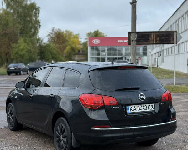 Черный Опель Астра, объемом двигателя 1.69 л и пробегом 300 тыс. км за 6150 $, фото 6 на Automoto.ua
