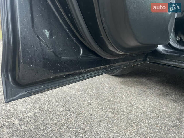 Черный Опель Астра, объемом двигателя 1.4 л и пробегом 210 тыс. км за 5900 $, фото 19 на Automoto.ua