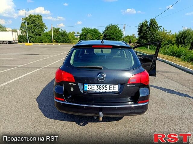 Черный Опель Астра, объемом двигателя 1.7 л и пробегом 260 тыс. км за 6300 $, фото 2 на Automoto.ua