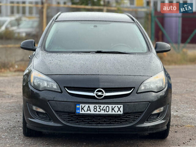Черный Опель Астра, объемом двигателя 1.7 л и пробегом 300 тыс. км за 6150 $, фото 1 на Automoto.ua