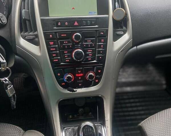 Черный Опель Астра, объемом двигателя 1.3 л и пробегом 284 тыс. км за 5950 $, фото 4 на Automoto.ua