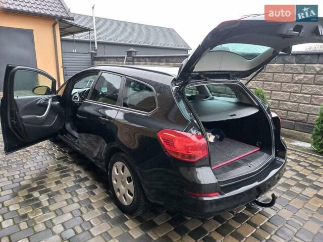 Черный Опель Астра, объемом двигателя 1.7 л и пробегом 185 тыс. км за 6650 $, фото 10 на Automoto.ua